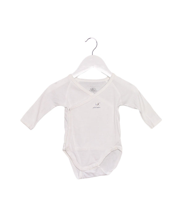 A White Long Sleeve Bodysuits from Petit Bateau in size 0-3M for girl. (Front View)