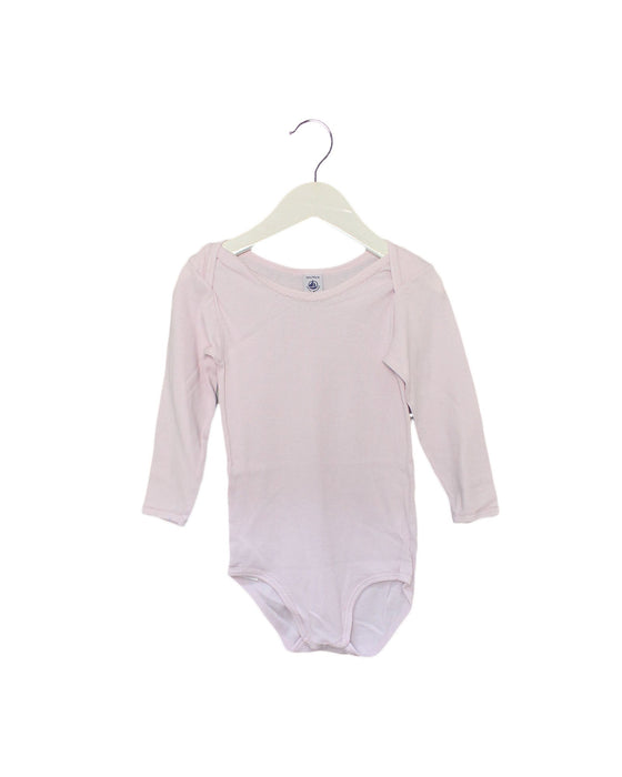 A Pink Long Sleeve Bodysuits from Petit Bateau in size 3T for girl. (Front View)