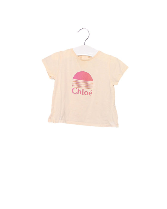 A Pink Short Sleeve T Shirts from Chloe in size 6-12M for girl. (Front View)