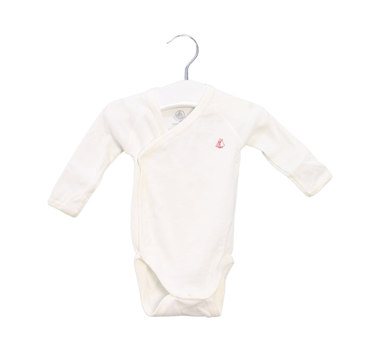 A Ivory Long Sleeve Bodysuits from Petit Bateau in size 0-3M for boy. (Front View)
