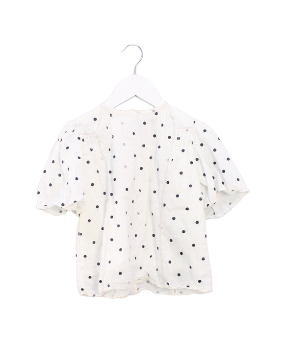 A Ivory Short Sleeve Tops from Velveteen in size 6T for girl. (Front View)
