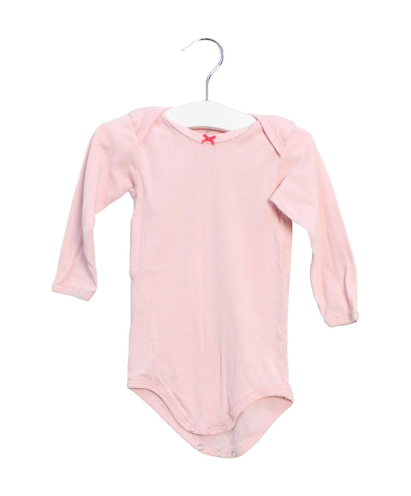 A Pink Long Sleeve Bodysuits from Petit Bateau in size 6-12M for girl. (Front View)