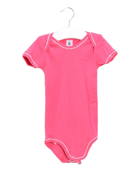 A Pink Short Sleeve Bodysuits from Petit Bateau in size 18-24M for girl. (Front View)