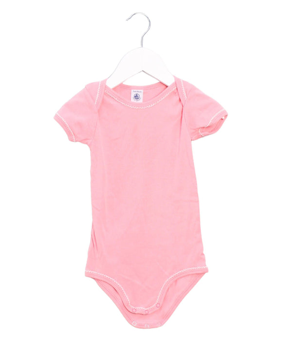 A Pink Short Sleeve Bodysuits from Petit Bateau in size 18-24M for girl. (Front View)