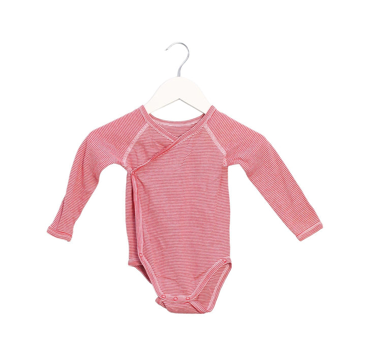 A Red Long Sleeve Bodysuits from Petit Bateau in size 6-12M for boy. (Front View)