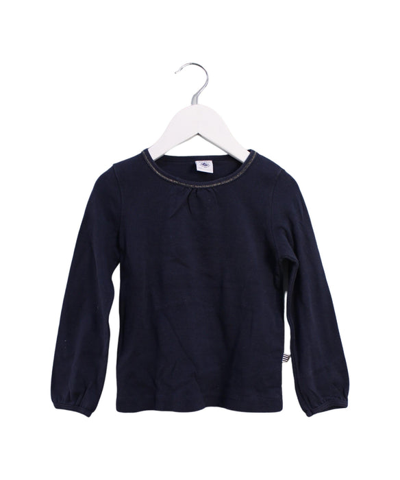 A Navy Long Sleeve Tops from Petit Bateau in size 4T for girl. (Front View)