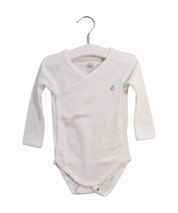 A White Long Sleeve Bodysuits from Petit Bateau in size 6-12M for neutral. (Front View)