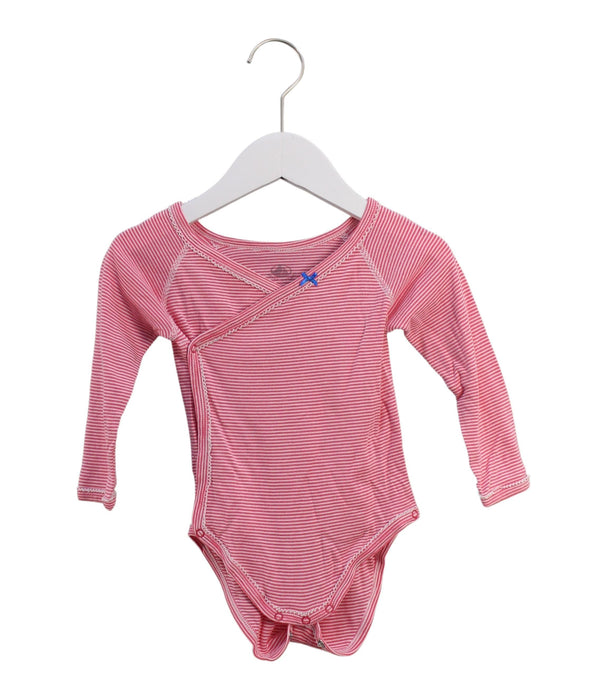 A Pink Long Sleeve Bodysuits from Petit Bateau in size 6-12M for girl. (Front View)