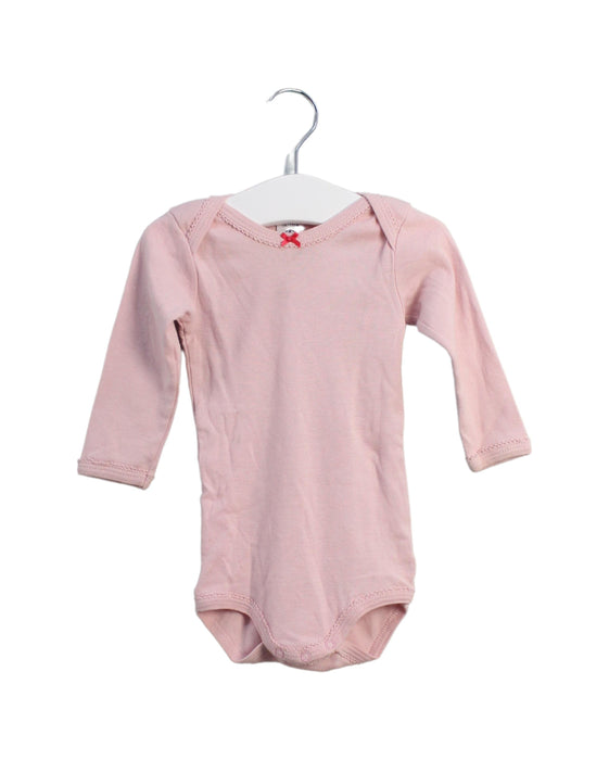 A Pink Long Sleeve Bodysuits from Petit Bateau in size 3-6M for girl. (Front View)