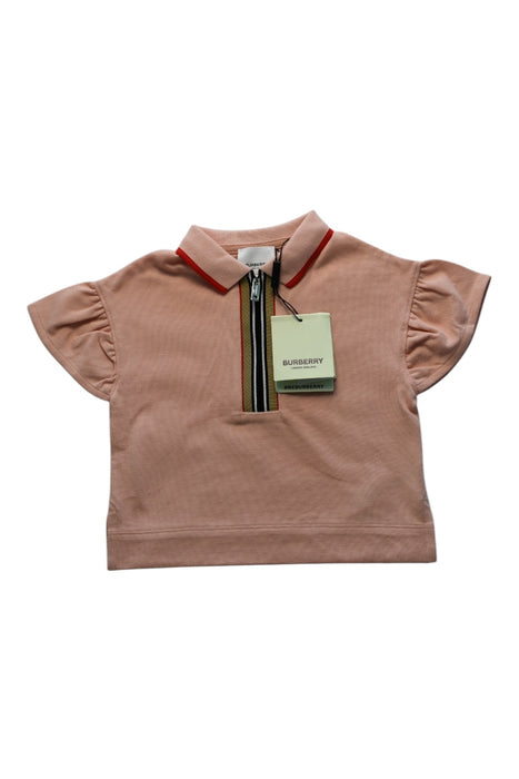 A Pink Short Sleeve Polos from Burberry in size 2T for girl. (Front View)