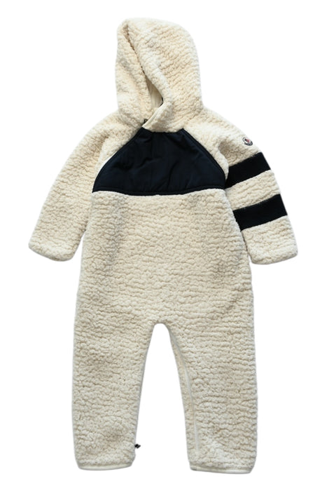 A Beige Snowsuits from Moncler in size 6-12M for girl. (Front View)
