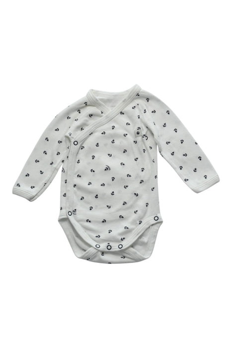A White Long Sleeve Bodysuits from Petit Bateau in size 0-3M for boy. (Front View)