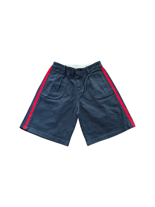 A Navy Shorts from Gucci in size 6T for boy. (Front View)
