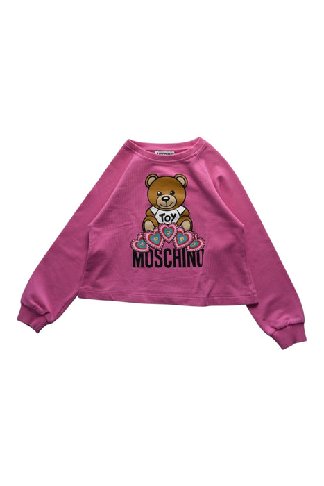 A Pink Crewneck Sweatshirts from Moschino in size 4T for girl. (Front View)
