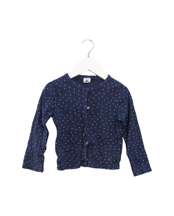 A Navy Long Sleeve Tops from Petit Bateau in size 4T for girl. (Front View)