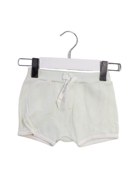 A Green Shorts from Petit Bateau in size 12-18M for girl. (Front View)