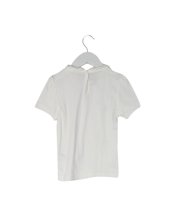 A Ivory Short Sleeve Tops from Petit Bateau in size 6T for girl. (Back View)