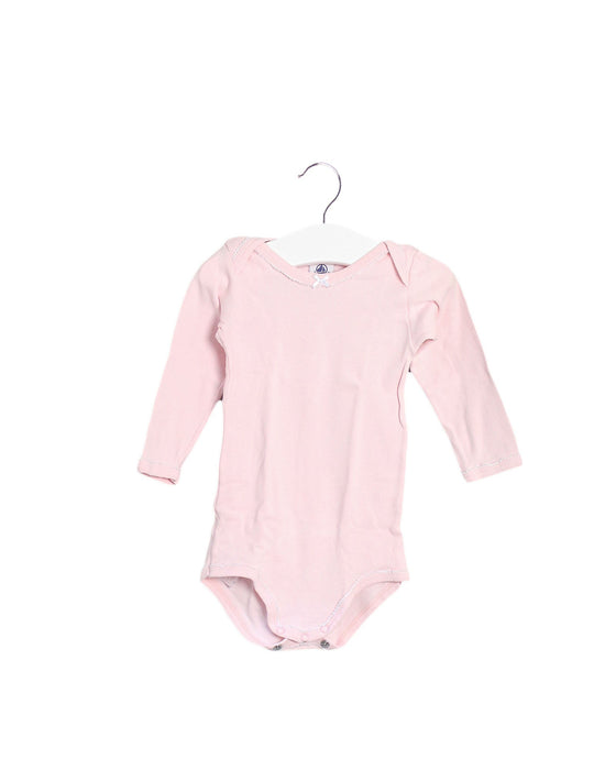 A Pink Long Sleeve Bodysuits from Petit Bateau in size 6-12M for girl. (Front View)