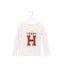 A White Long Sleeve Tops from Tommy Hilfiger in size 5T for girl. (Front View)