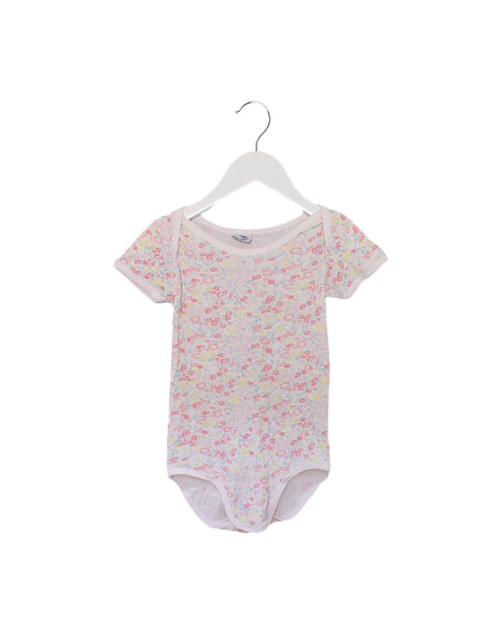 A Pink Short Sleeve Bodysuits from Petit Bateau in size 3T for girl. (Front View)