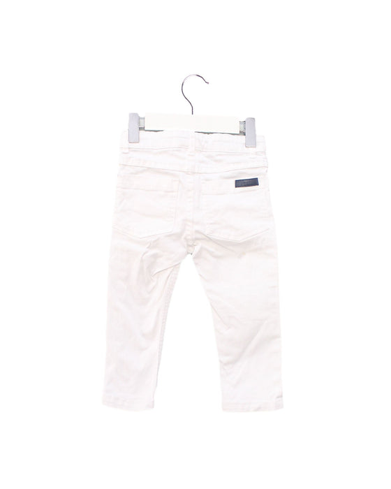 A White Jeans from Jacadi in size 12-18M for girl. (Back View)
