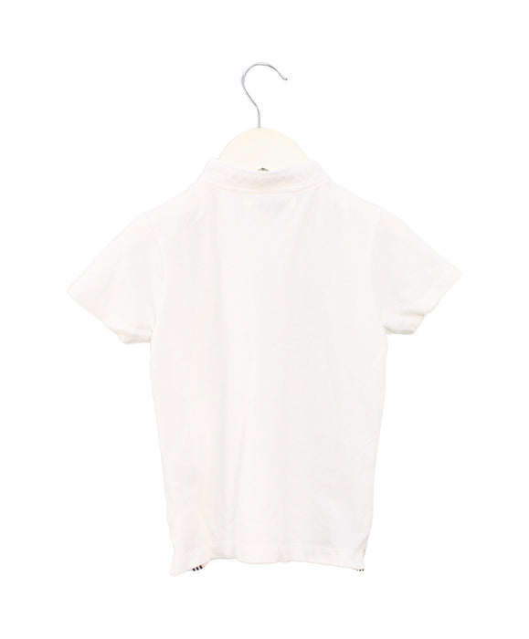 A White Short Sleeve Polos from Bonpoint in size 4T for boy. (Back View)