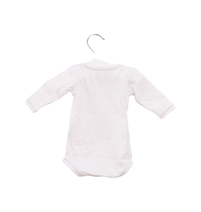 A White Long Sleeve Bodysuits from Petit Bateau in size 0-3M for girl. (Back View)