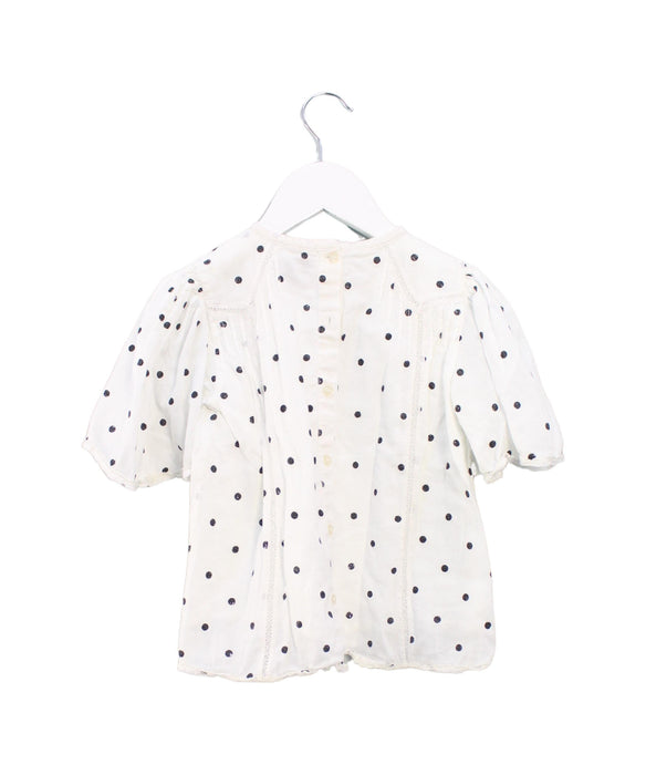 A Ivory Short Sleeve Tops from Velveteen in size 6T for girl. (Back View)