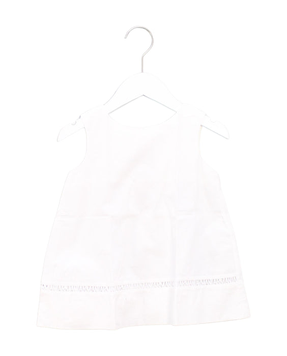 A White Sleeveless Dresses from Armani in size 4T for girl. (Front View)