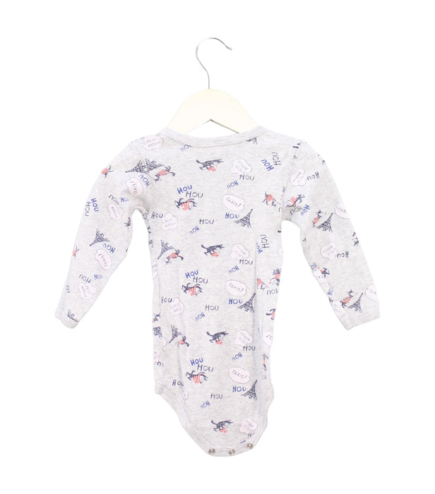 A Grey Long Sleeve Bodysuits from Petit Bateau in size 12-18M for boy. (Back View)