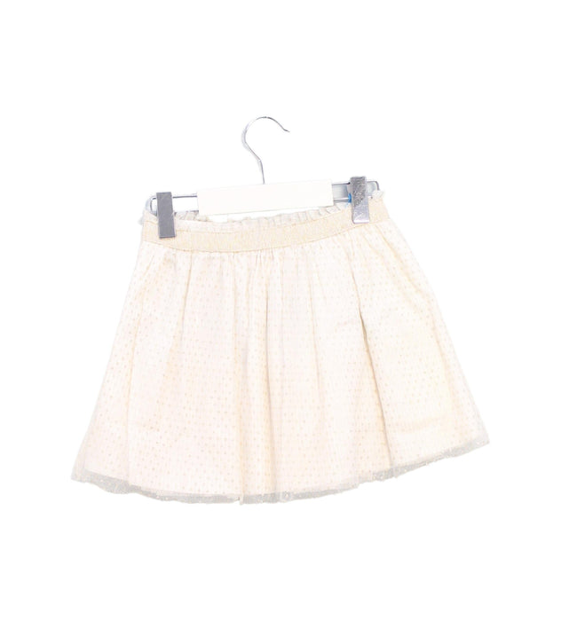 A Ivory Short Skirts from Jacadi in size 4T for girl. (Back View)