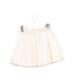 A Ivory Short Skirts from Jacadi in size 4T for girl. (Back View)
