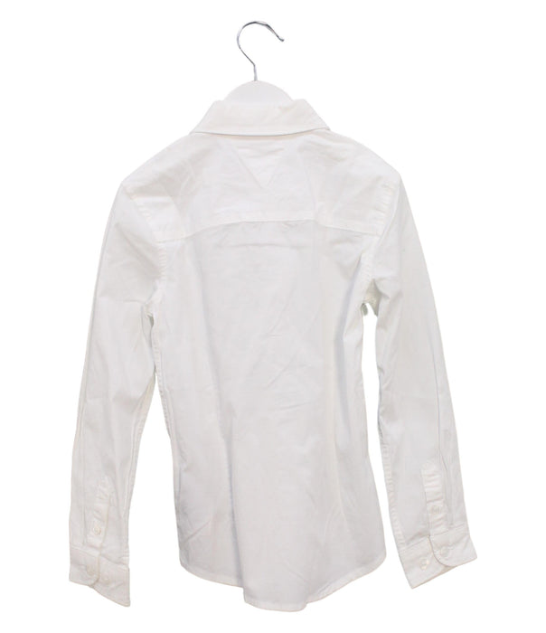 A White Shirts from Tommy Hilfiger in size 6T for boy. (Back View)