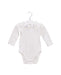 A White Long Sleeve Bodysuits from Jacadi in size 3-6M for girl. (Front View)