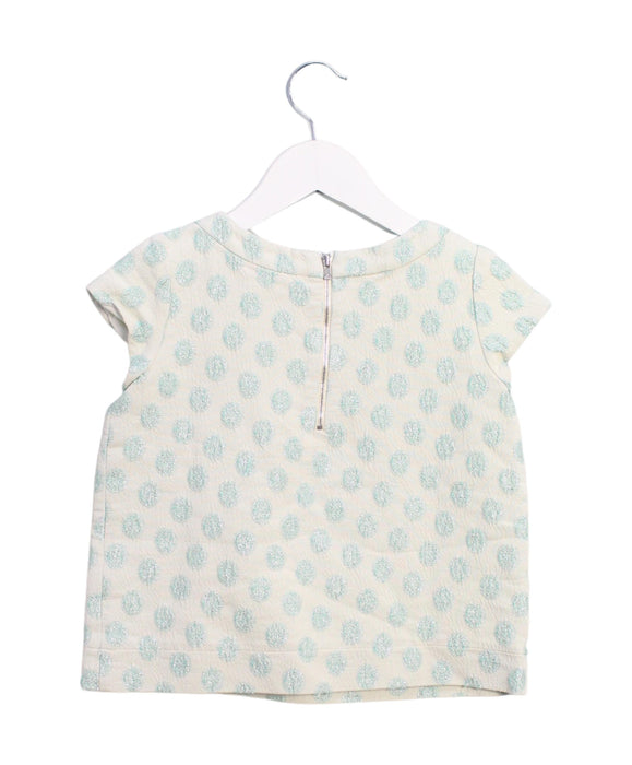 A Ivory Short Sleeve Tops from Bonpoint in size 6T for girl. (Back View)