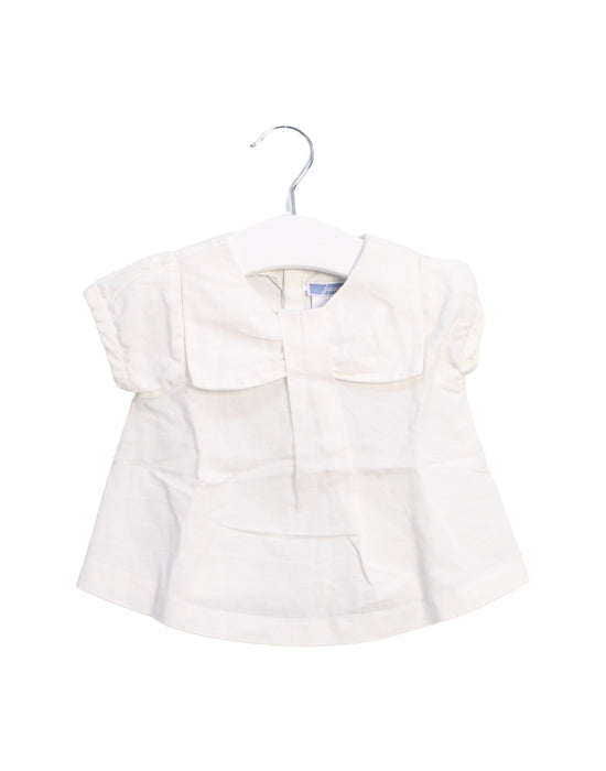 A White Short Sleeve Tops from Jacadi in size 6-12M for girl. (Front View)