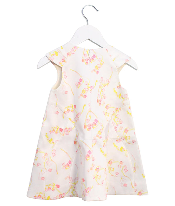 A White Sleeveless Dresses from Dior in size 12-18M for girl. (Back View)