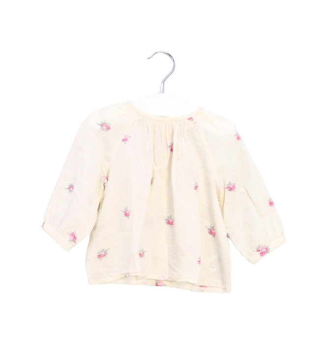 A Ivory Long Sleeve Tops from Bonpoint in size 6-12M for girl. (Front View)
