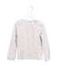 A Grey Long Sleeve Tops from Petit Bateau in size 5T for girl. (Front View)