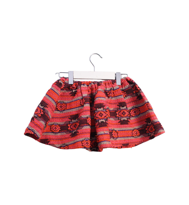 A Orange Short Skirts from Louise Misha in size 4T for girl. (Back View)