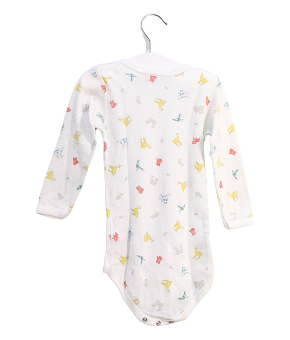 A White Long Sleeve Bodysuits from Petit Bateau in size 12-18M for neutral. (Back View)
