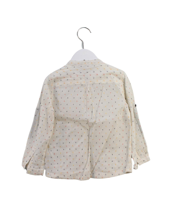 A Ivory Long Sleeve Tops from Velveteen in size 6T for girl. (Back View)