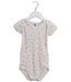 A Beige Short Sleeve Bodysuits from Petit Bateau in size 18-24M for girl. (Front View)