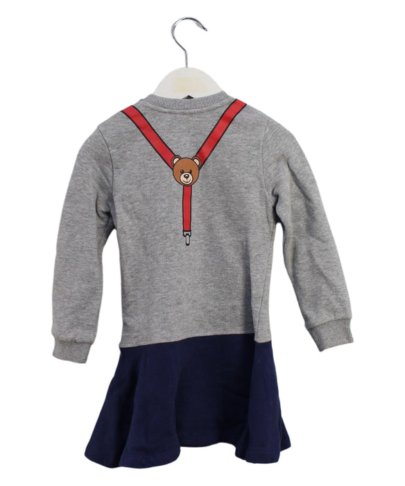 A Grey Long Sleeve Dresses from Moschino in size 3T for girl. (Back View)
