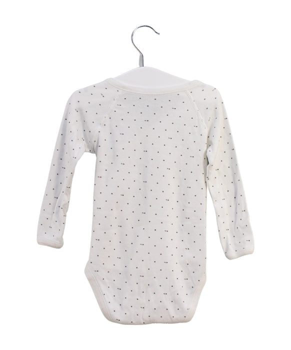 A White Long Sleeve Bodysuits from Petit Bateau in size 6-12M for boy. (Back View)