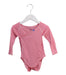 A Pink Long Sleeve Bodysuits from Petit Bateau in size 6-12M for girl. (Front View)