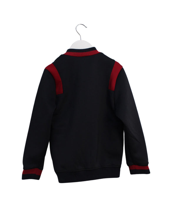 A Navy Lightweight Jackets from Jacadi in size 8Y for boy. (Back View)