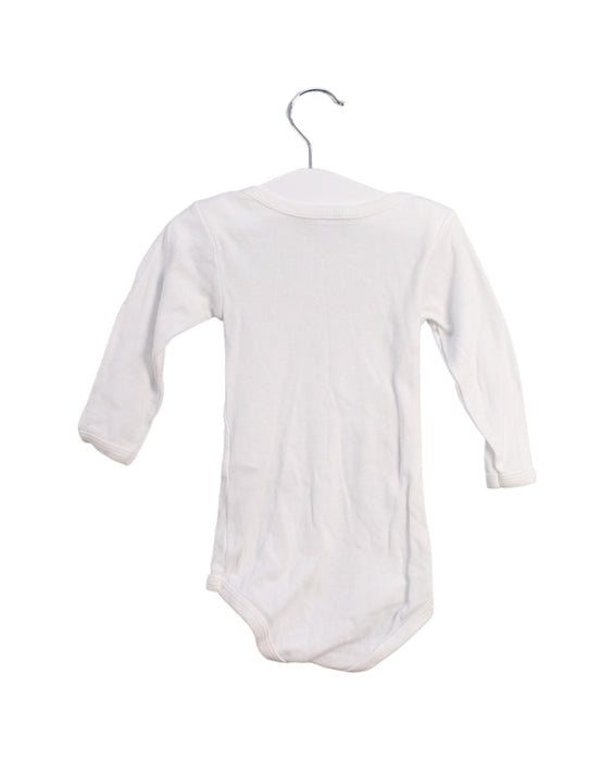 A White Long Sleeve Bodysuits from Petit Bateau in size 6-12M for girl. (Back View)