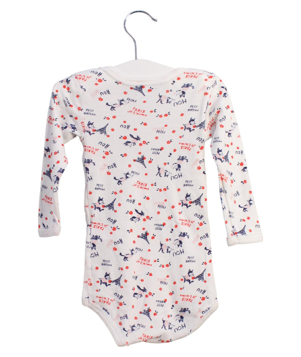 A White Long Sleeve Bodysuits from Petit Bateau in size 6-12M for girl. (Back View)