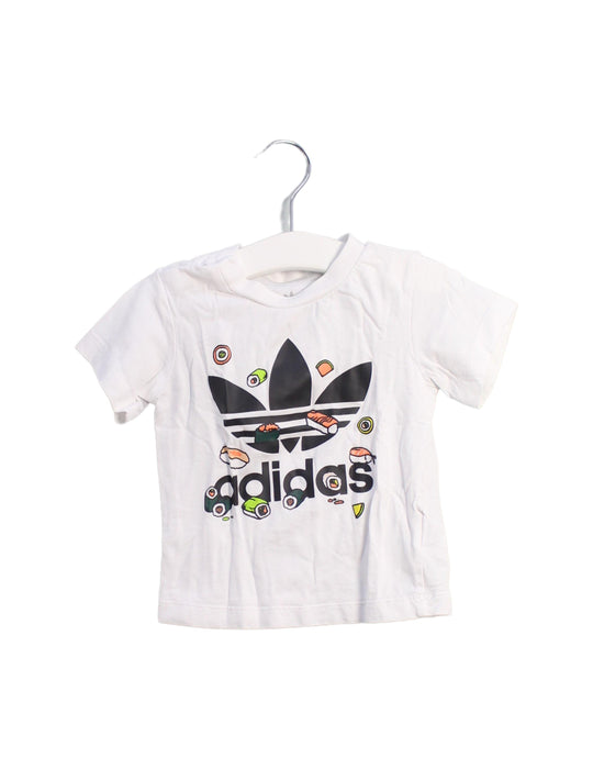 A White Short Sleeve T Shirts from Adidas in size 6-12M for girl. (Front View)